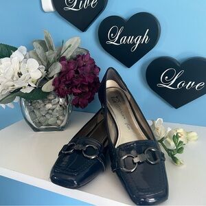 Anne Klein blue patent fold leather flat with toggle type accents size 8.